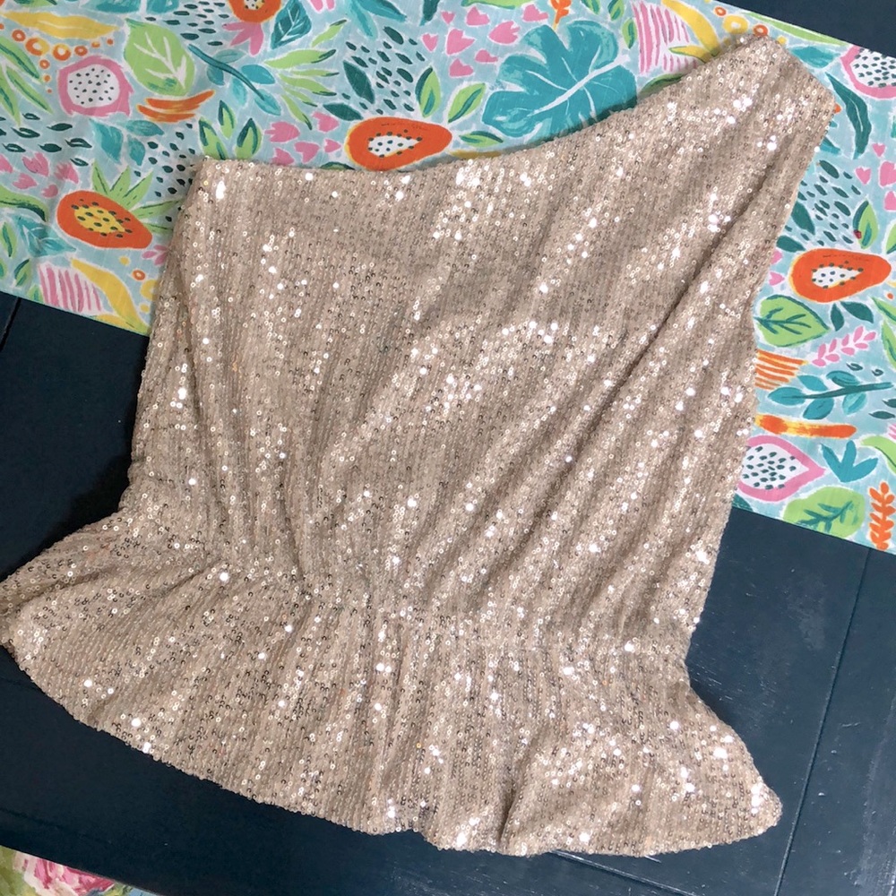 NEW WITH TAGS. One shoulder sequin top